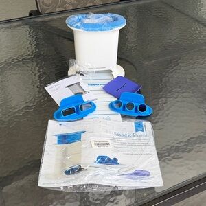 Tupperware Snack Press with Blue and White Components NEW in packaging.